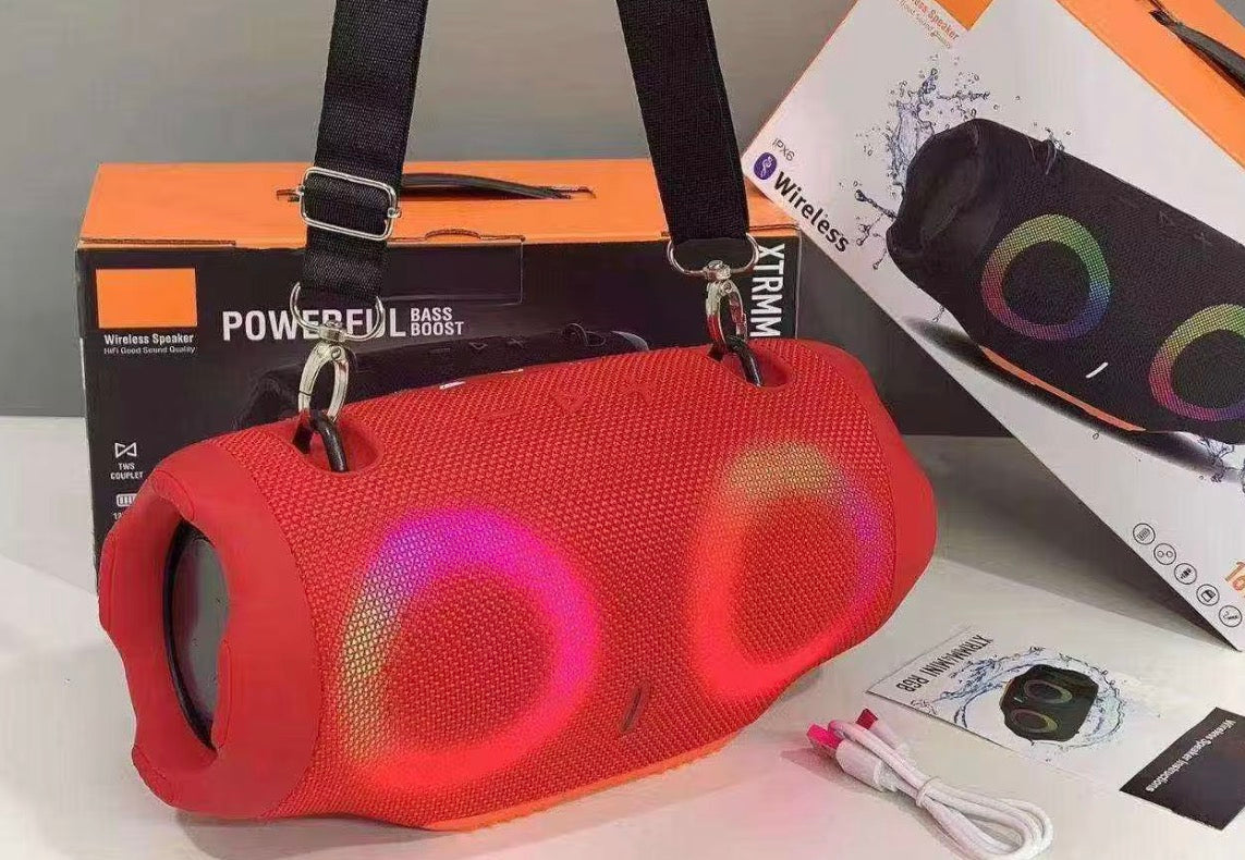 Corneta Portátil Bluetooth Modelo IX32, a prueba de agua, incluye ganchos